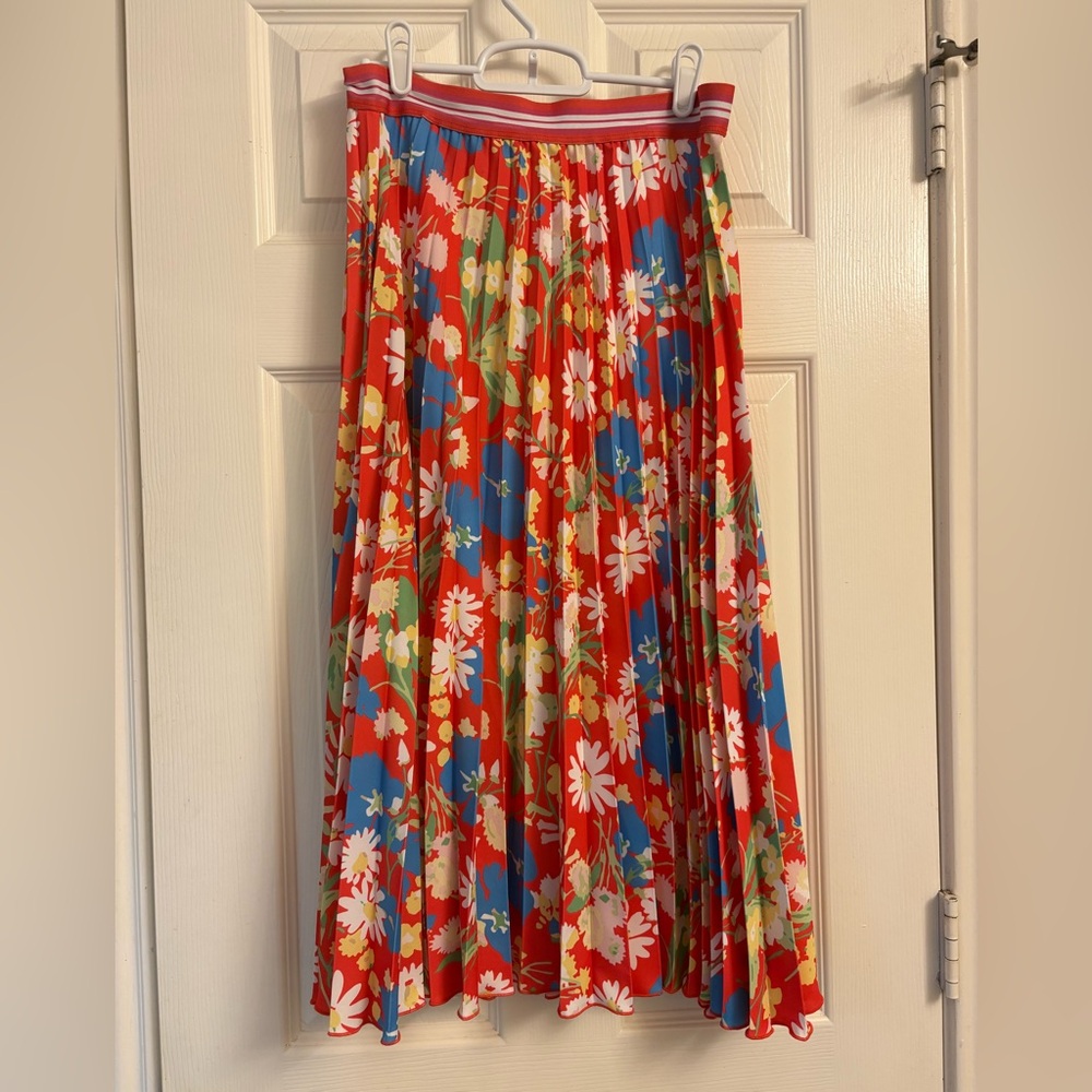 Twisted Wunder London vibrant pleated midi skirt.